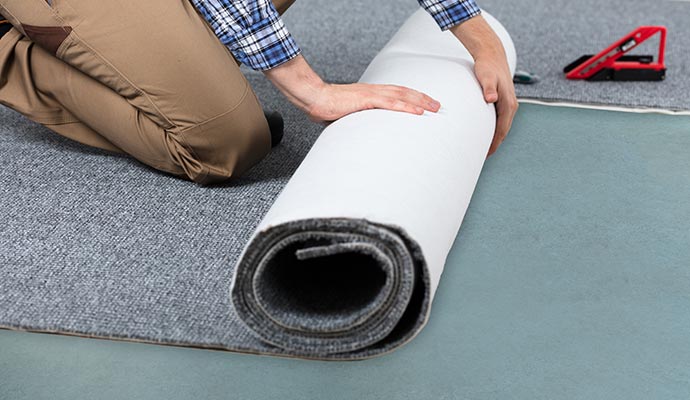 Someone is replacing carpet